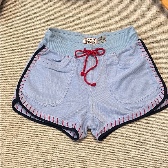one 432 Pants - Stylish Light Blue Athletic Shorts with‎ Red Accents